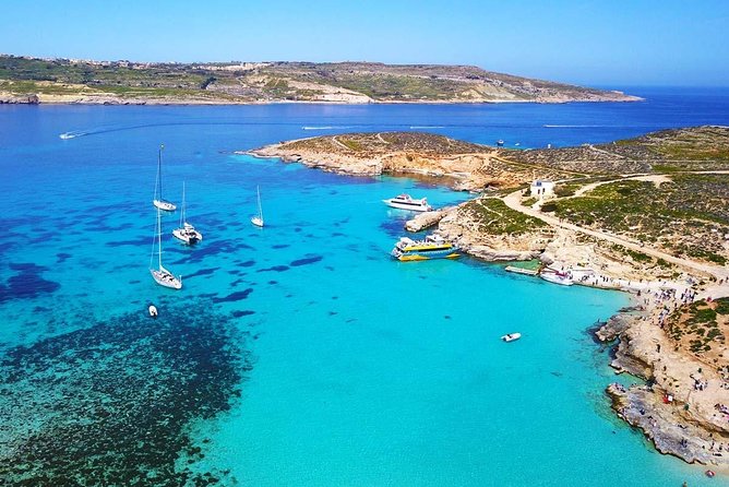 Blue Lagoon, Beaches and Bays Catamaran Sailing Tour - Ghajn Tuffieħa Bay option: sandy time, easy lounging, and a calmer rhythm