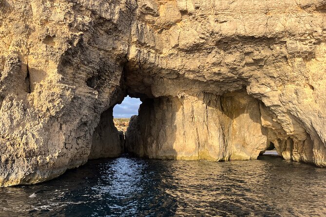 Blue Lagoon Ferry and Caves Tour - The cave pass on the return: Window cave, Crystal Lagoon cave, and more