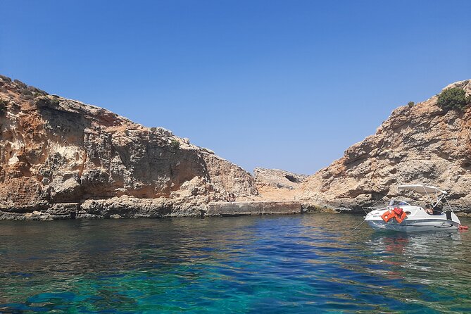 Boat Charters Blue lagoon, Crystal Lagoon, Comino, Malta 4hr trip - St Mary’s Tower and other movie sights from the water