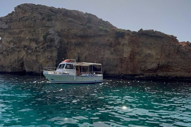 Comino and Parts of Gozo Full Day Private Boat Charter - Blue Lagoon anchor swim: turquoise water, less crowd pressure