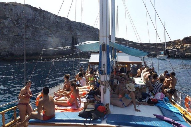 Comino, Blue Lagoon and Caves. Tour A - Entering the Comino zone: Crystal Lagoon and cave photo time