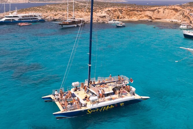 Comino Blue Lagoon Prime Catamaran Tour with All Inclusive - Comino Stop: Bays, Snorkeling Time, and Blue Lagoon Only If the Sea Behaves