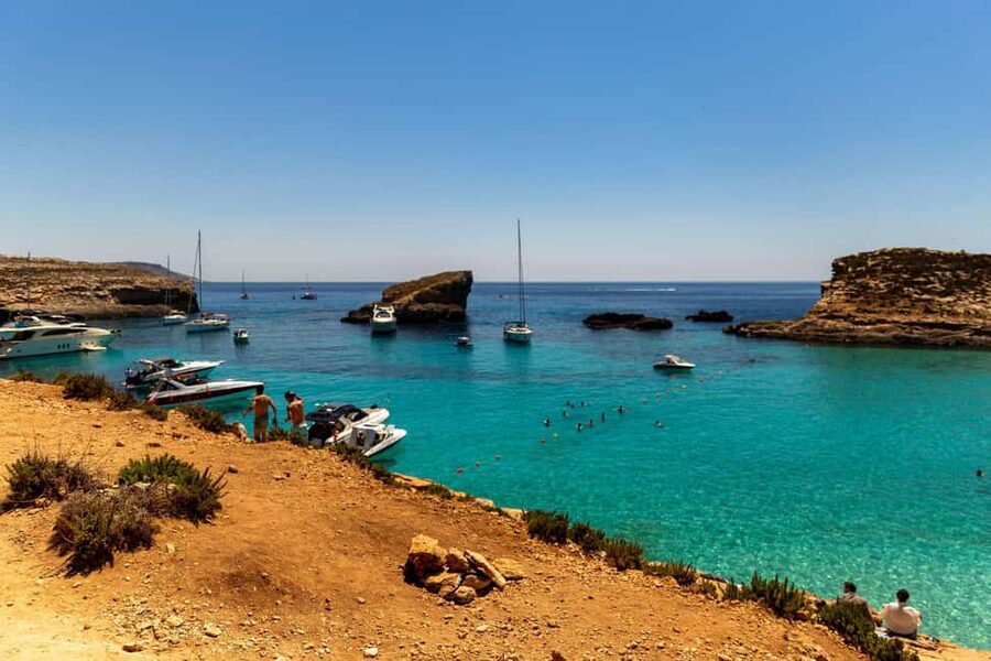 From Bugibba: Blue Lagoon Sunset Cruise - Price and logistics: $28 for 3.5 hours that ends by 9