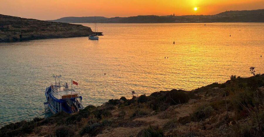 From Bugibba: Blue Lagoon Sunset Cruise - Sunset on the water from Bugibba Jetty