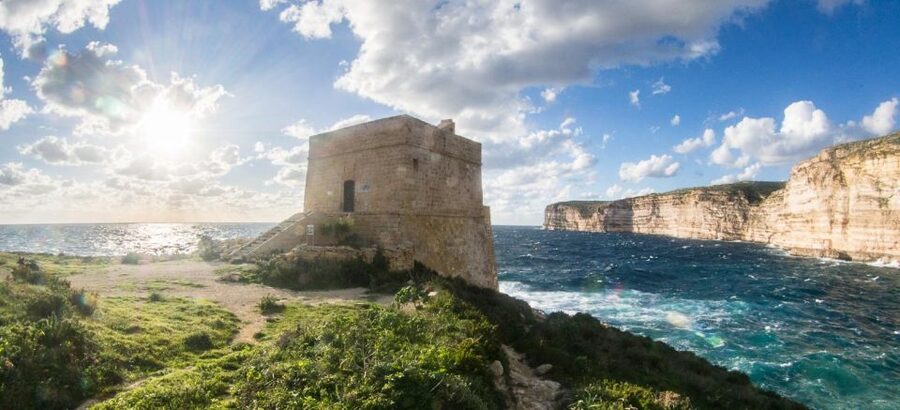 From Malta: Gozo Jeep Tour with Lunch and Transfers - Return to Malta: Boat Passing Blue Lagoon, Crystal Lagoon, and Sea Caves