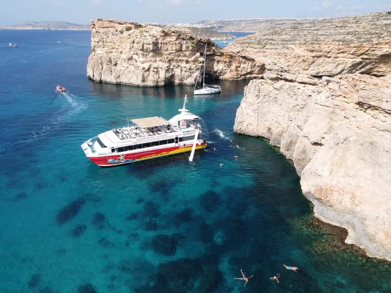 From Sliema: Comino, Crystal Lagoon, and Blue Lagoon Cruise - Onboard extras: slide, decks, and comfort basics