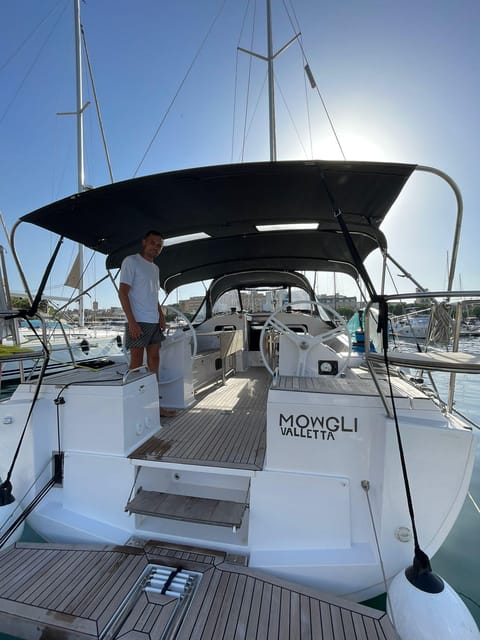 From Valletta: Romantic Sunset Cruise on a Sailing Yacht - Captain Evgheni and the romance factor that feels practical