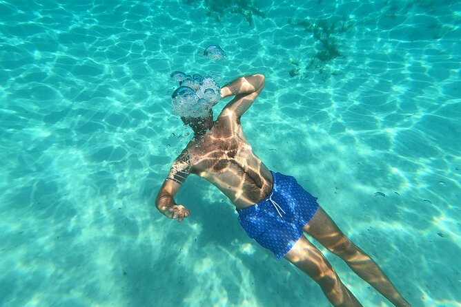Gozo and Comino Boat and Snorkeling Adventure - First real snorkeling: Barbagann Rocks and Gozo’s cave stops