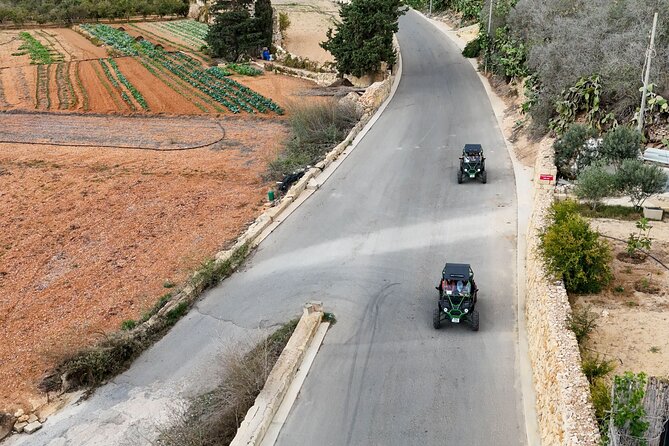 Gozo Buggy Tour: All-inclusive Day Trip + Blue Lagoon - Xlendi Bay and the Seaside Scene: Cliffs, Water, and a Small Town Reset