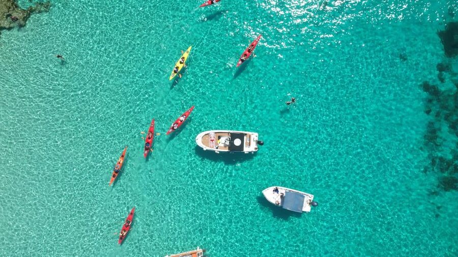 Gozo: Comino and Blue Lagoon Guided Kayaking Adventure - The Blue Lagoon swim stop: turquoise water, short and sweet