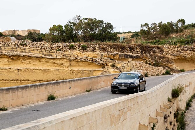Gozo Highlights Tour in a comfortable private vehicle - Xwejni Salt Pans and the coast: a photo stop that also teaches a story