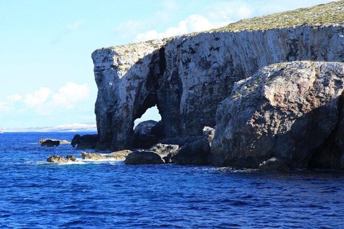 Half Day Malta Tour to Gozo Comino and Blue Lagoon Caves - Cruising Gozo Harbour and San Niklaw Bay: the photo sightseeing that helps the story