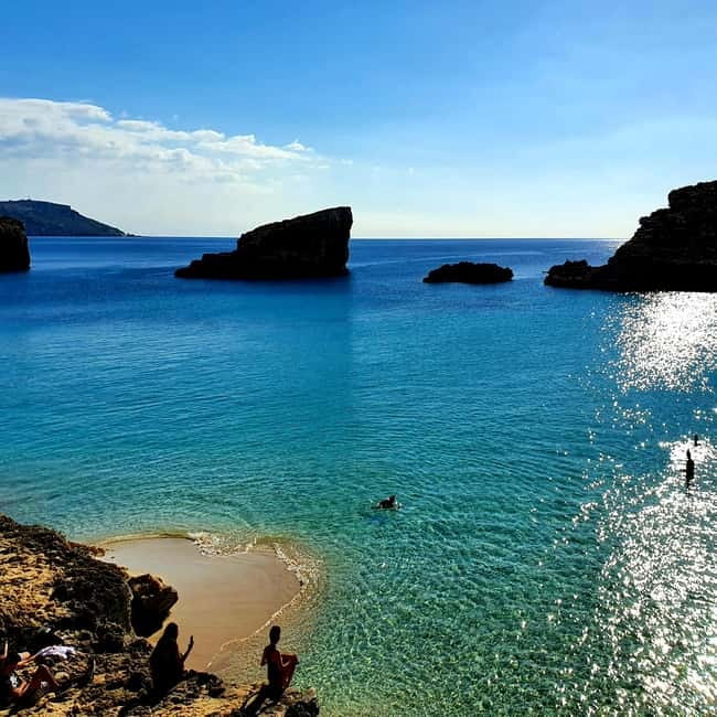 Malta: 3 Bay Cruise to Selmun Bay, Blue Lagoon and Gozo - Ħalfa Rock on Gozo: dramatic cliffs plus another swim moment