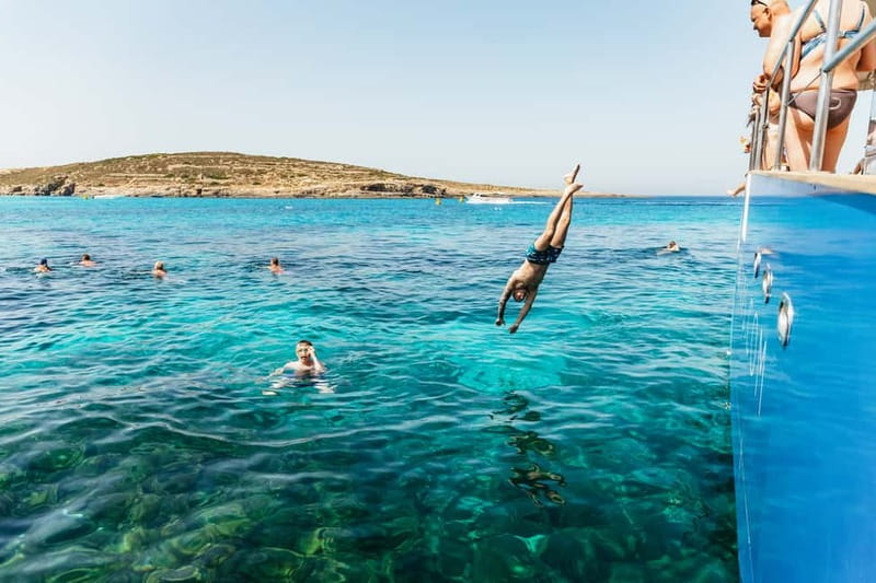 Malta: Blue Lagoon, Beaches & Bays Trip by Catamaran - Blue Lagoon swim stop: turquoise water, plus why offshore anchoring can be a win