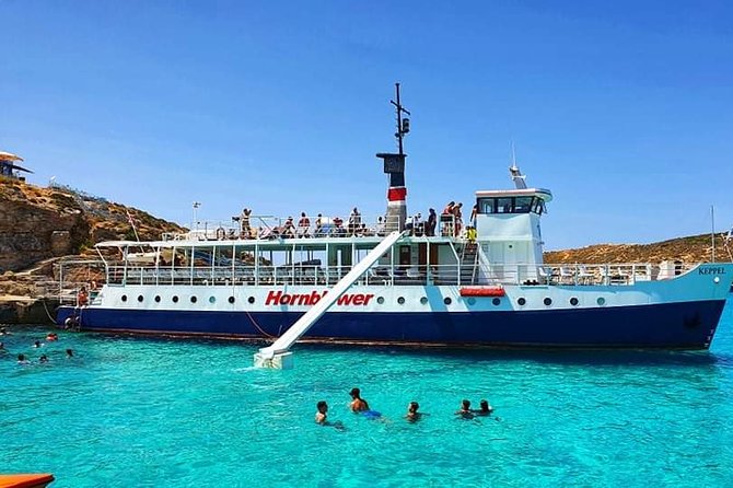 Malta: Comino, Blue Lagoon & Caves - swim, snorkel & slide - Blue Lagoon time: the real reason you booked