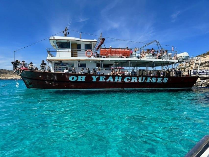 Malta: Gozo Comino and Blue Lagoon Boat Tour with Swim Stop - Cruising Comino and Malta highlights: Coral Lagoon, Santa Maria Tower, and Crystal Lagoon