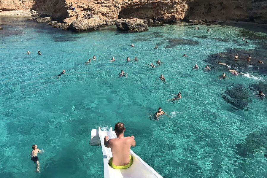 Malta: Gozo, Comino, Blue & Crystal Lagoon, & Caves Cruise - Comino lounge time and why you stay on the boat