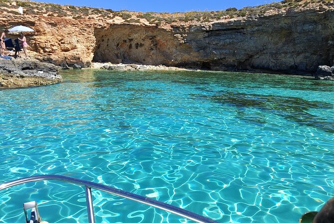 MALTA-Gozo Comino Caves Crystal Blue Lagoon Private Boat Trips - Blue Lagoon stop: the classic swim hour (and why anchoring matters)
