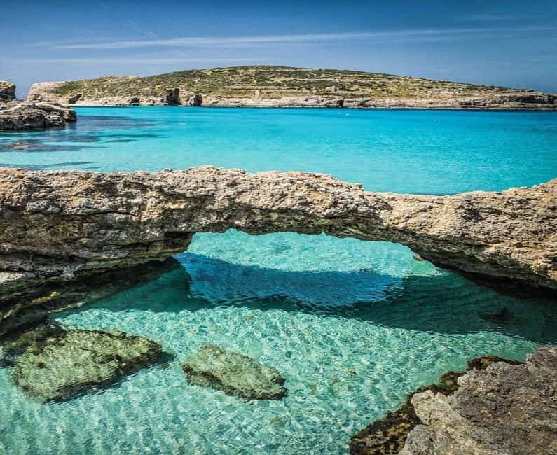 Malta: Private Boat Cruise with Caves, Beaches & Swim Stops - Comino caves and the rock-and-water stops around Blue Lagoon