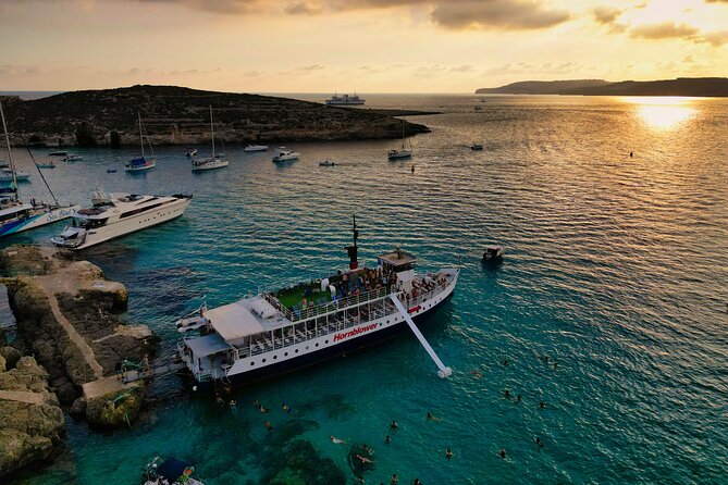 Malta Sunset Boat Tour: Bugibba to Comino Blue Lagoon Cruise - Bugibba Jetty boarding: where you go and how to get your best spot