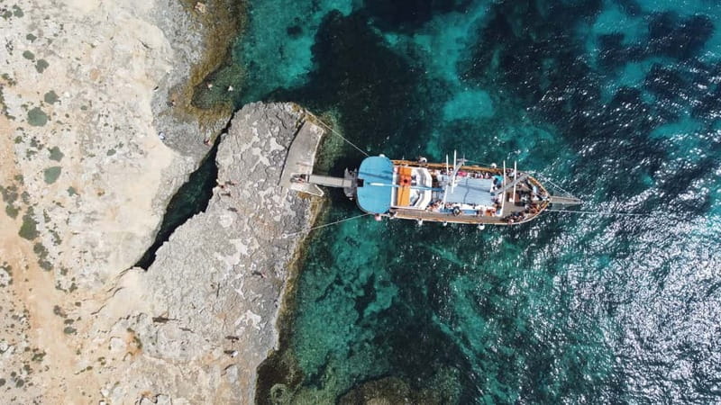 Malta: Sunset Cruise to Blue Lagoon and Caves - Crystal Lagoon photo stop: short, but useful