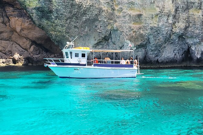 Mellieha: Gozo, Comino, Sea Caves, and Blue Lagoon Cruise - On-board comfort: bathroom, pace, and the included SUP
