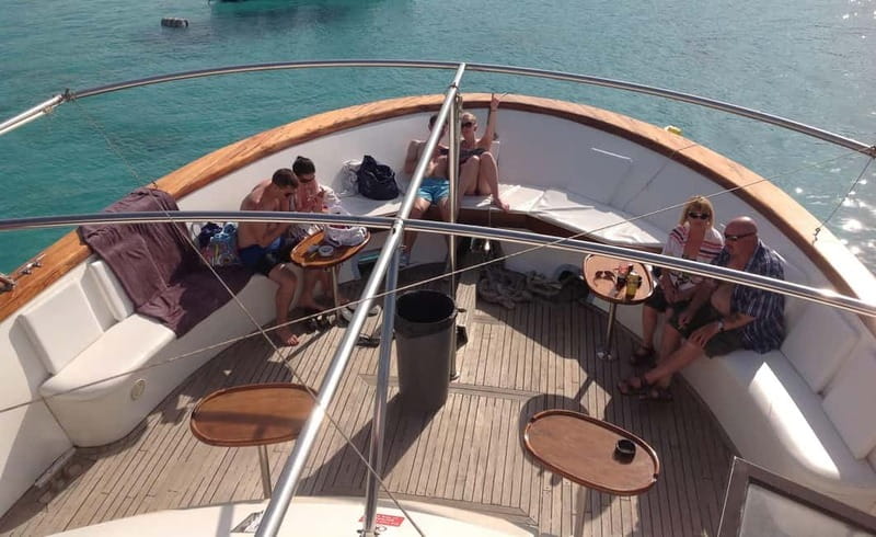Mellieha: Round Comino, Blue Lagoon & Gozo Cruise with Water - On-board extras that make this feel like a bargain