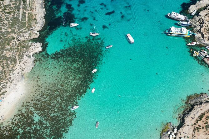 Private Boat Tour at Comino's Blue Lagoon and Crystal Lagoon - Blue Lagoon swim stop: quieter water and shade on board