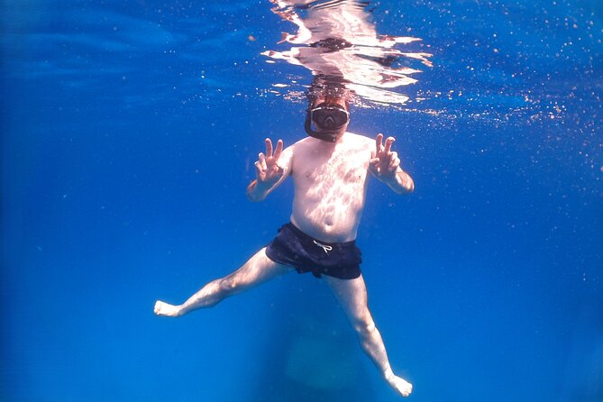 Private Boat Tour to Blue Lagoon Comino Caves and Gozo - Cominotto (Kemmunett): Quiet Coves and Rocky Sea Views