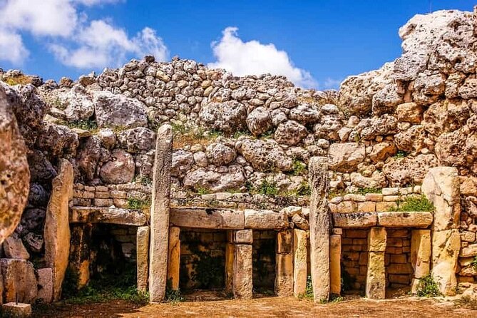 Private Buggy Tour in Gozo incl Driver, Transfers & Lunch - Wied il-Mielaħ Window and Mgarr ix-Xini: fast photo hits, then a bay with a watchtower
