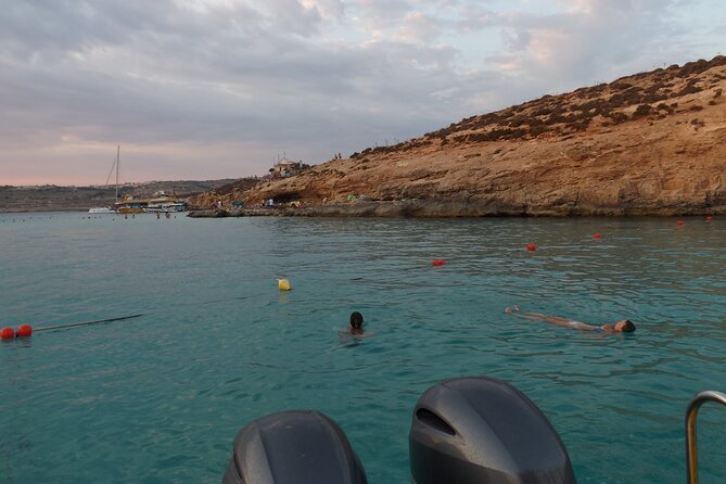 Private Speedboat 2hrs Crystal & Blue Lagoon Caves & Snorkelling - The view between stops: Comino Tower and what the coastline was built to do