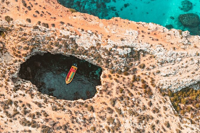 Private Speedboat 3hrs Blue Lagoon, Crystal Lagoon & Caves - Knights of St John watchtower and Cominotto caves: the scenery before the swimming