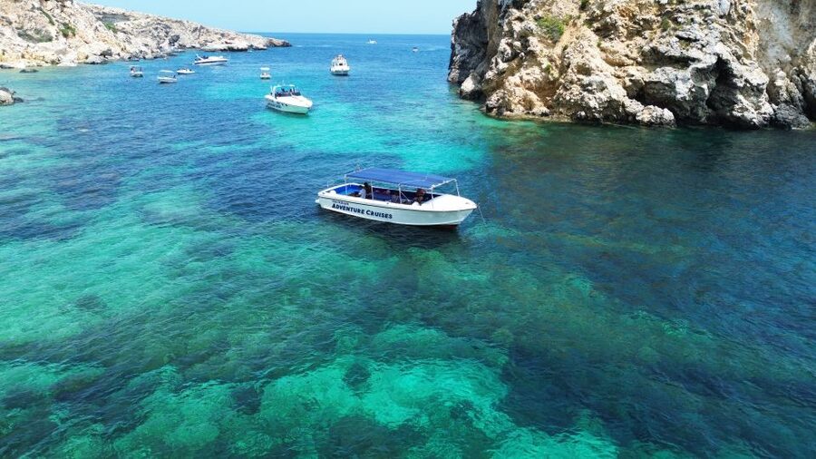 Sliema: Boat Trip to Comino Blue Lagoon, Gozo, and Caves - Comino Island time, and the online ticket rule from 1 May 2025