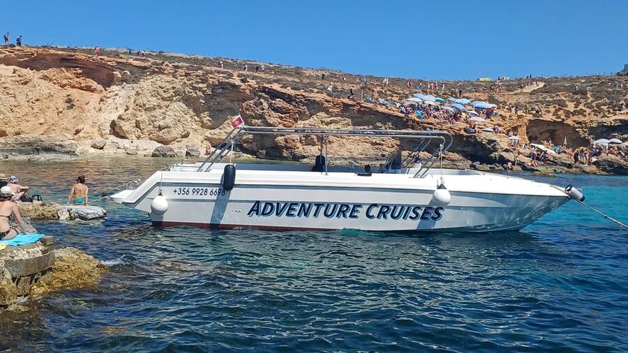 Sliema: Boat Trip to Comino Blue Lagoon, Gozo, and Caves - Ħalfa Rock near Gozo: another swim, another angle on the coastline
