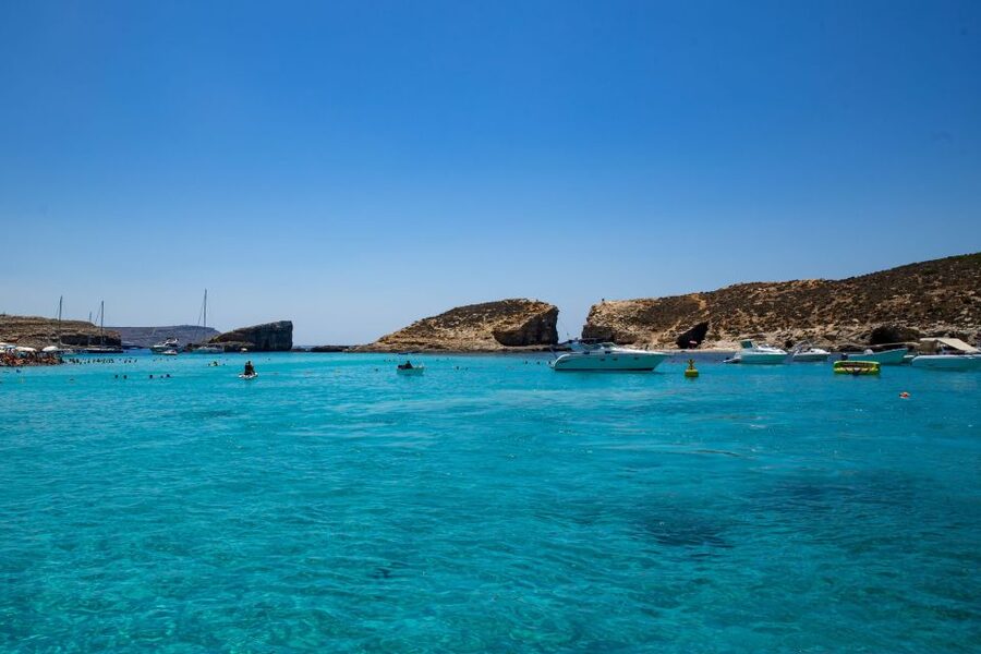 St Paul's Bay: Comino, Blue Lagoon, Gozo, & Caves Boat Tour - The sea cruise between stops: commentary that helps you read the coast