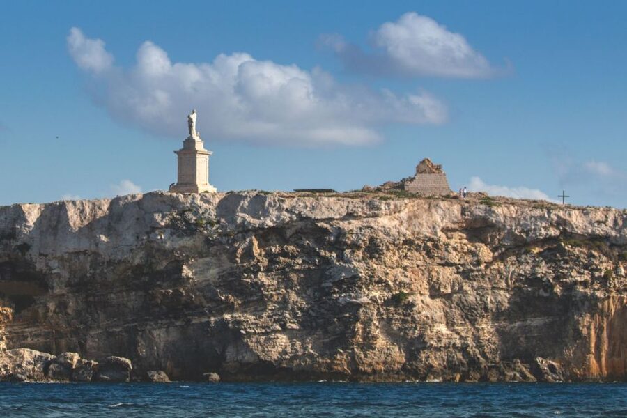 St. Paul's Bay: Gozo, Comino & St. Paul's Bus & Boat Tour - Boat cruising and cave access on a smaller ship