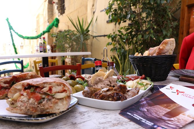 The Valletta Food Tour Experience, a private tour - What you eat: pastizzi, ftira, platter, kinnie beer, and sweet