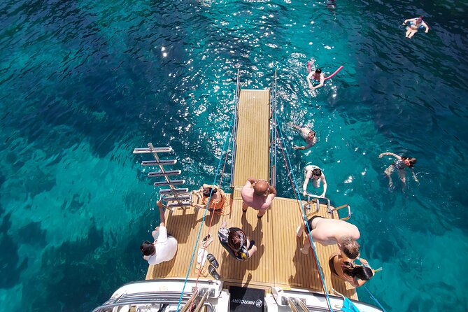 Three Bay Cruise Including Blue Lagoon from Mellieha - Stop 1 in Comino: Blue Lagoon swim stop and best ways to use 1.5 to 2 hours