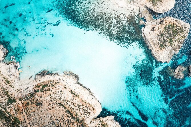 Three Bay Cruise Including Blue Lagoon from Mellieha - Onboard comfort, snacks, toilets, and the cash bar reality